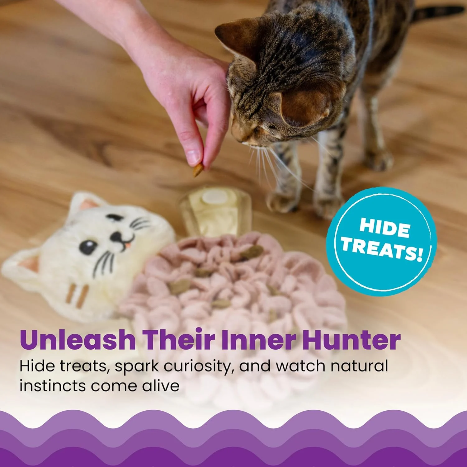 Adjusting hook and loop arms on snuffle mat