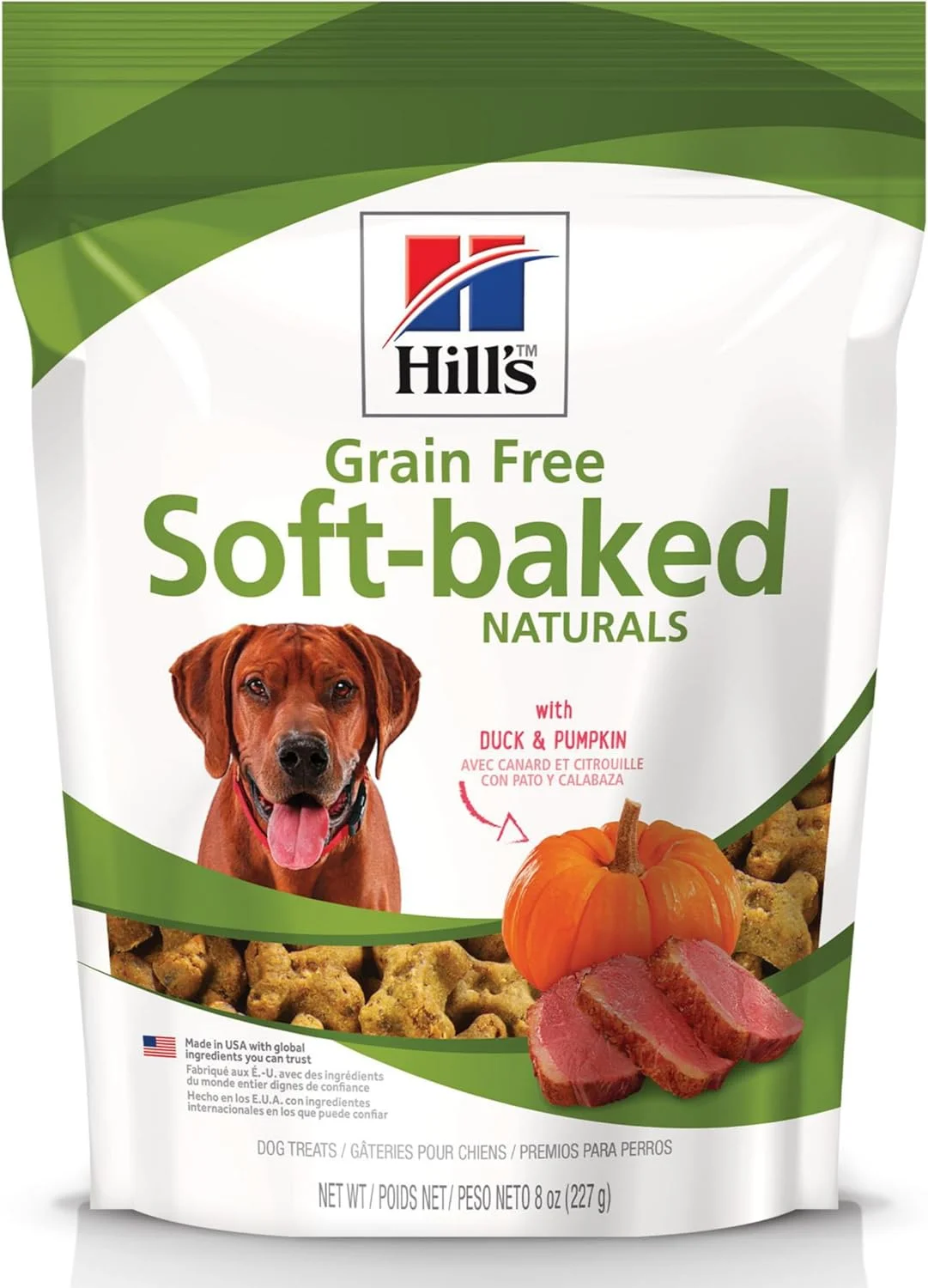 Senior dog enjoying a soft-baked treat
