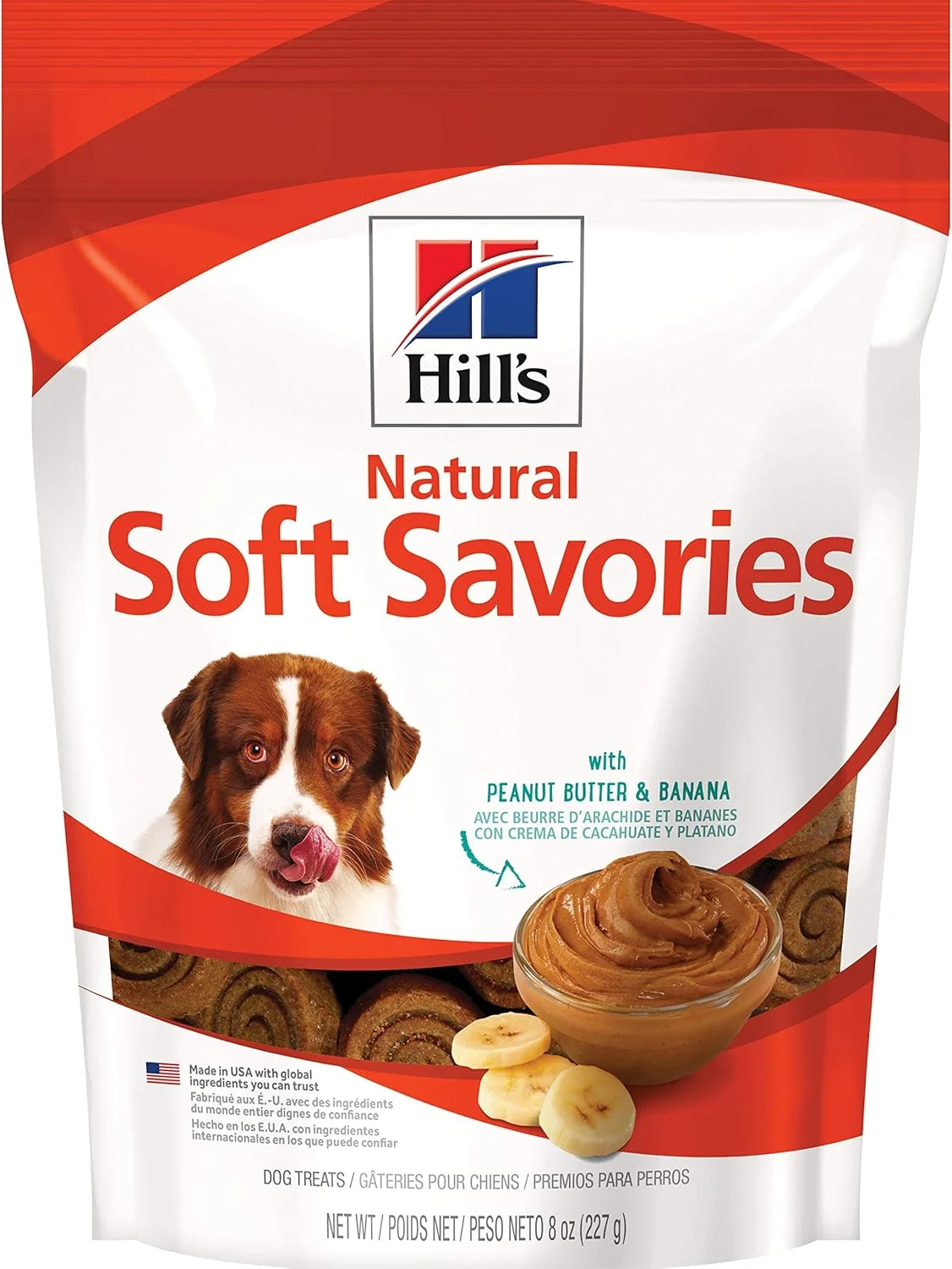 Happy dog enjoying a healthy peanut butter treat