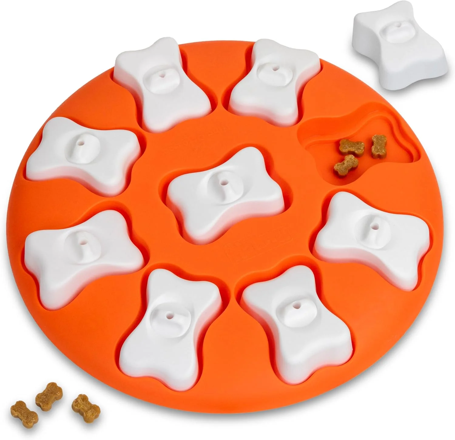 Dog engaging with Nina Ottosson puzzle toy