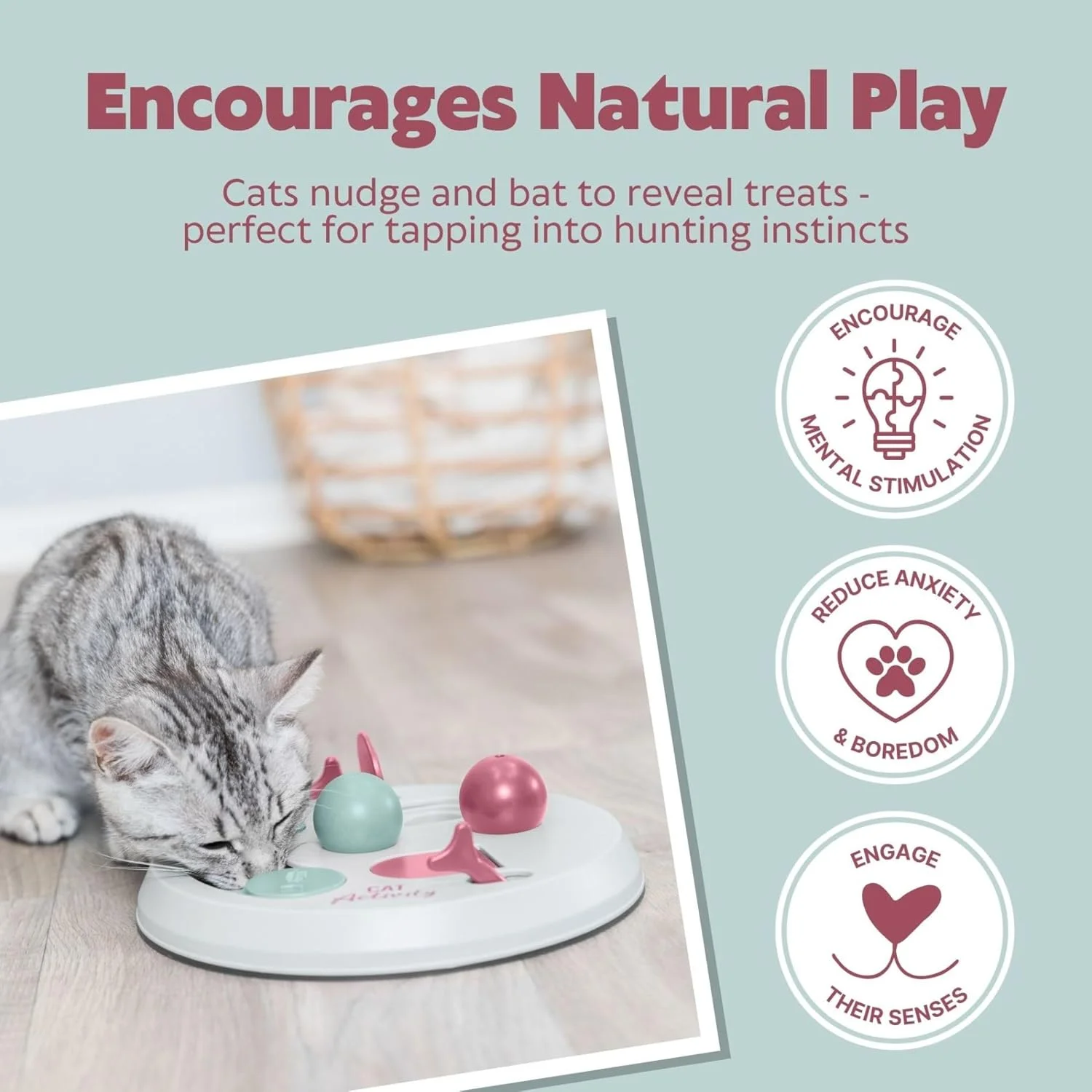 Cat playing with interactive puzzle toy